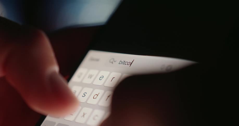 A person is using the keyboard on their phone to type