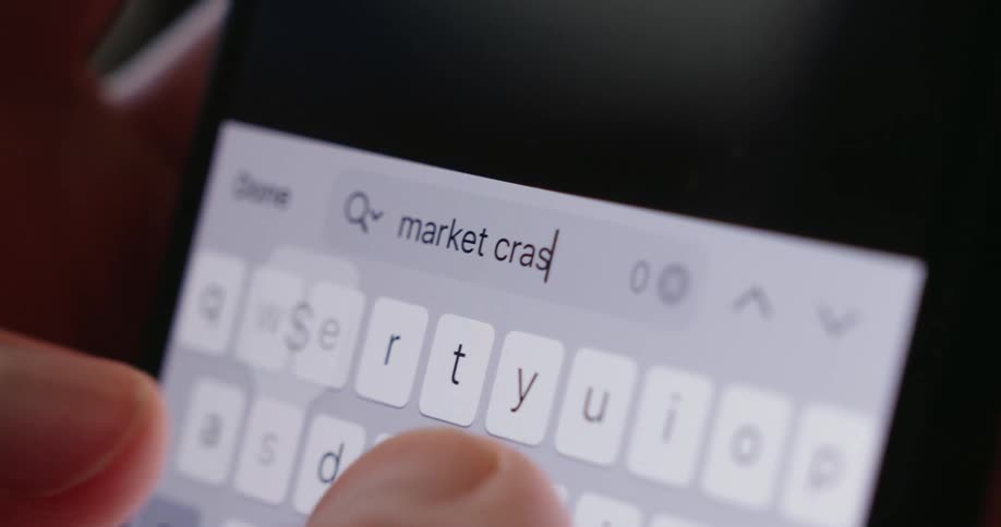 Pair of hands of a person typing on a smartphone
