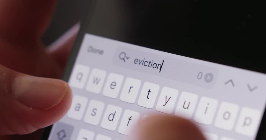 A person texts on their phone