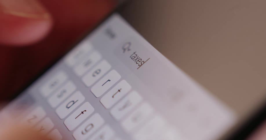 A person texts on their phone
