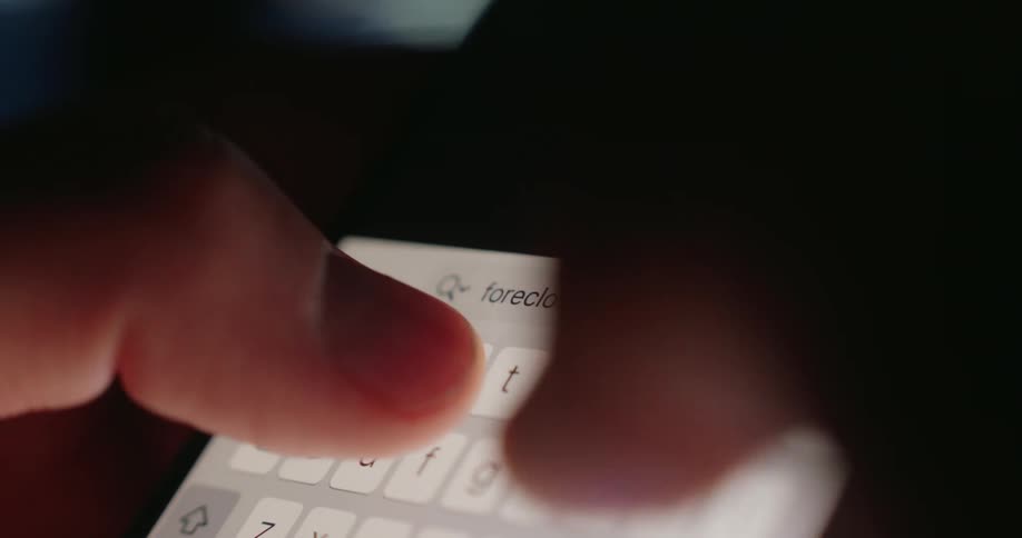 A person texts on their phone