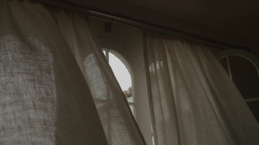 Curtains in the breeze