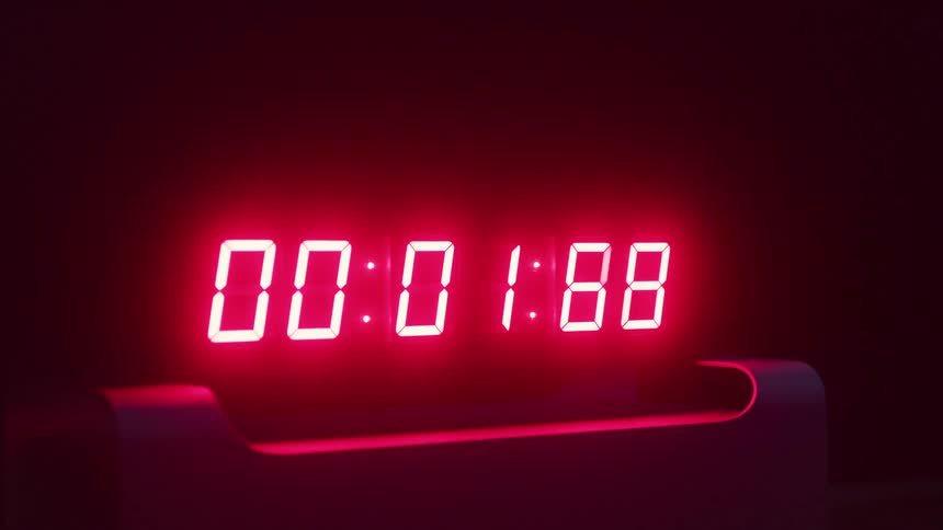 Close up of a neon red countdown display