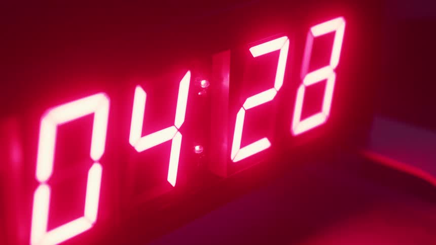 The clock has bright red numbers counting down