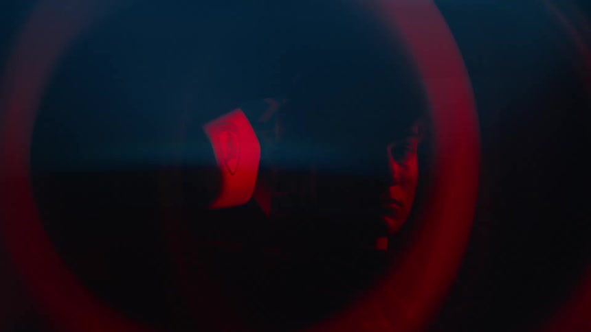 Silhouette of a person inside a car