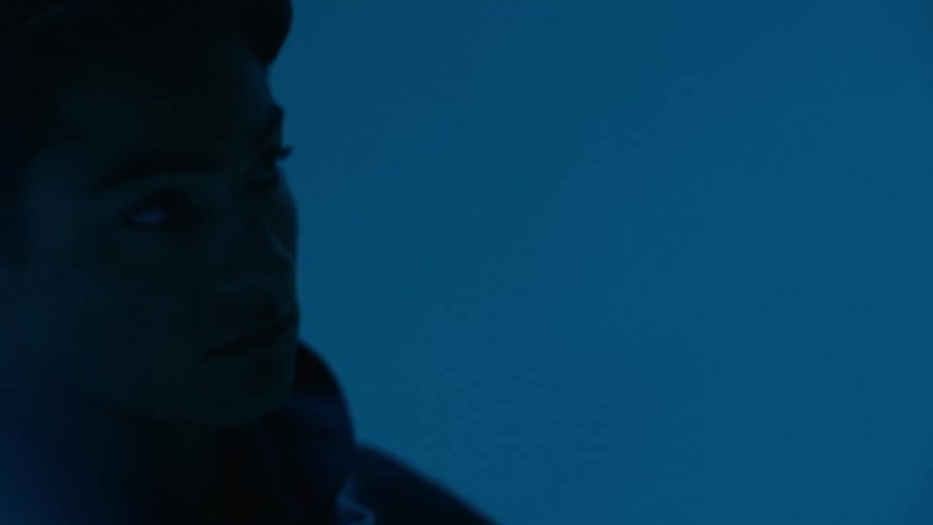 Silhouette of a man in an indoor space