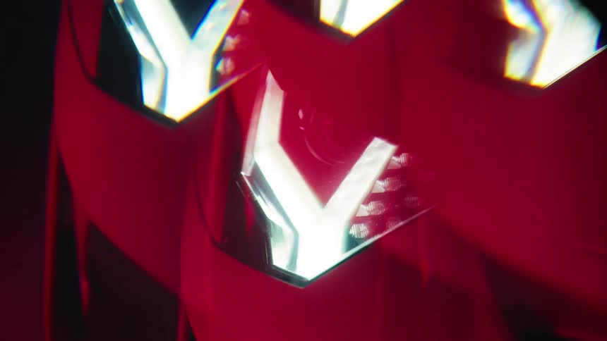 The headlight is shining on the sports car