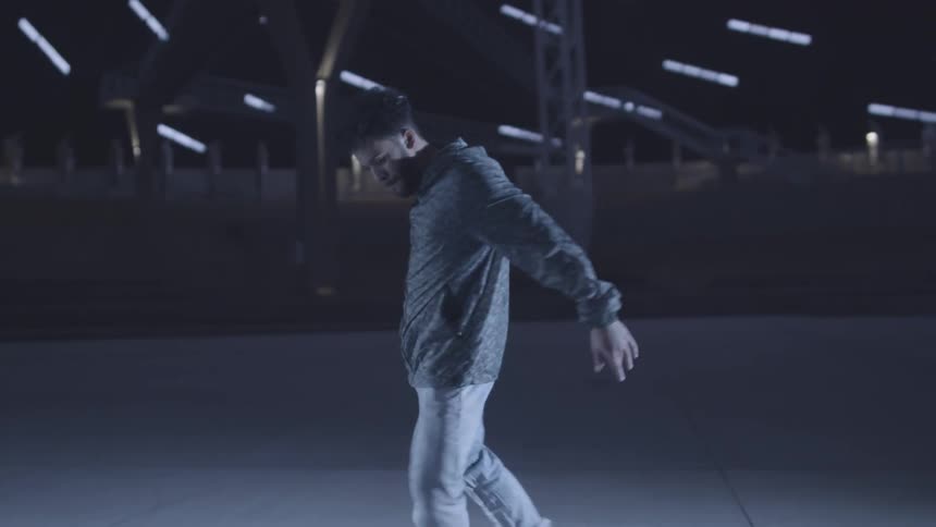 Man walking and starting to dance