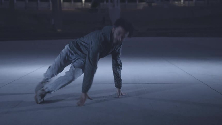 A man breakdances