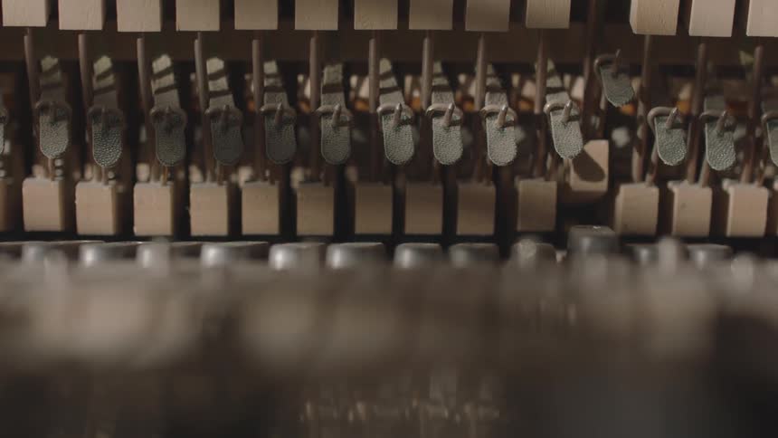 Close up of piano keys in motion