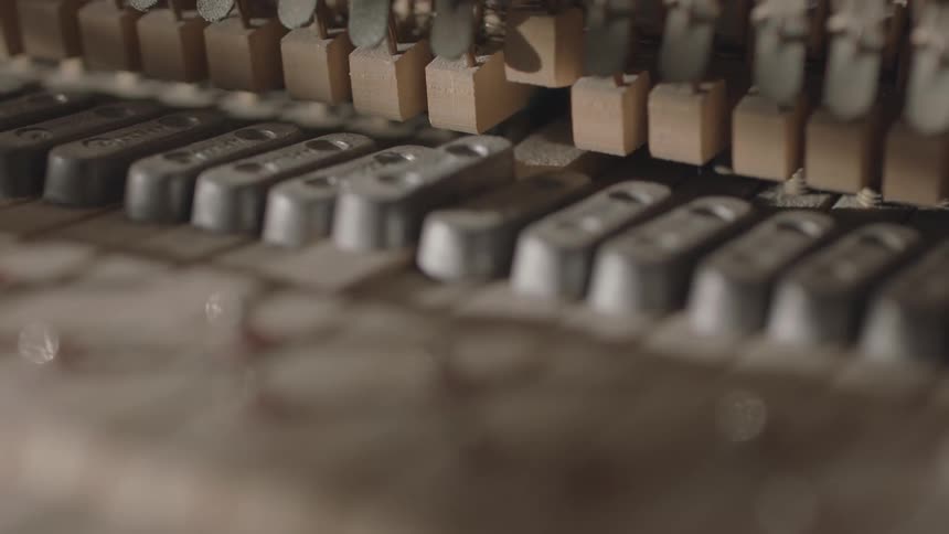 Close up of moving keys of a musical instrument