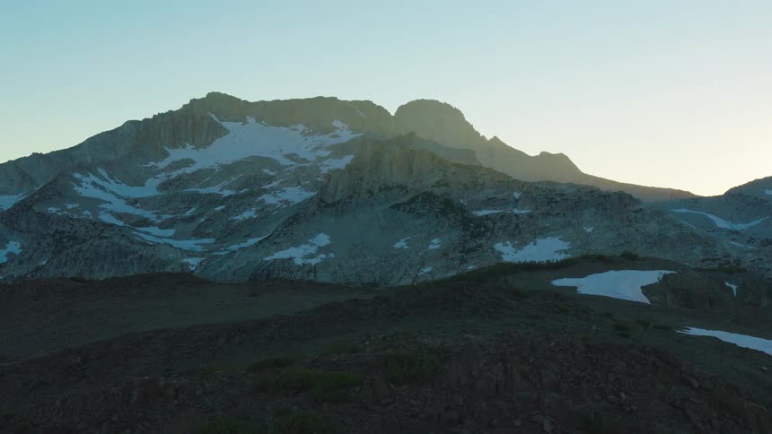 Mountain landscape at dawn with snow