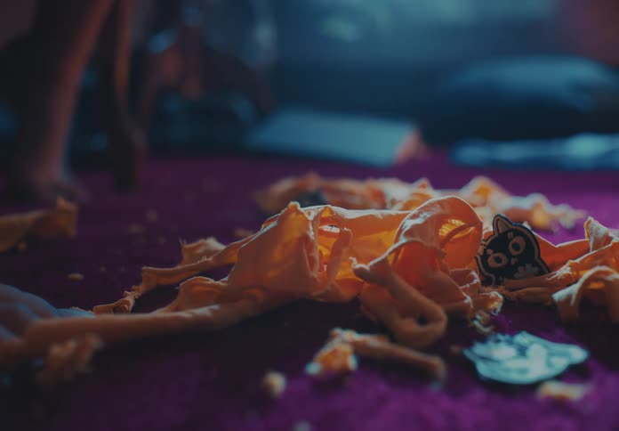 Person takes apart an outfit into small fabric pieces