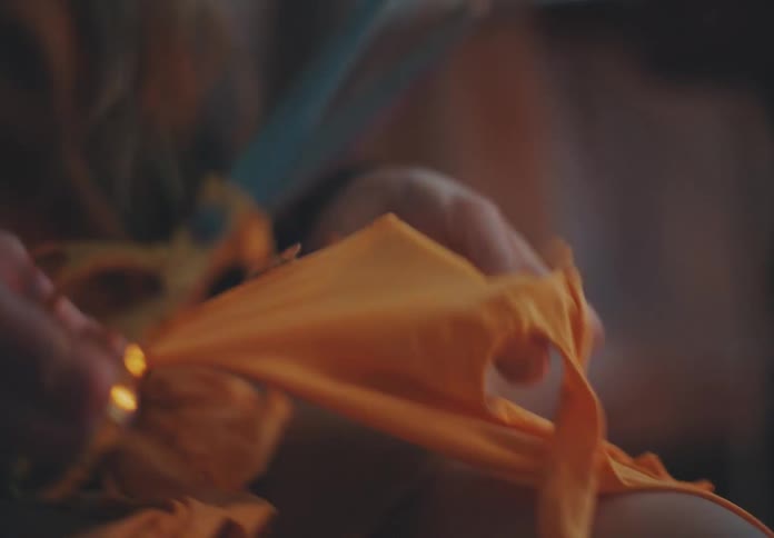 A woman is cutting up her stockings