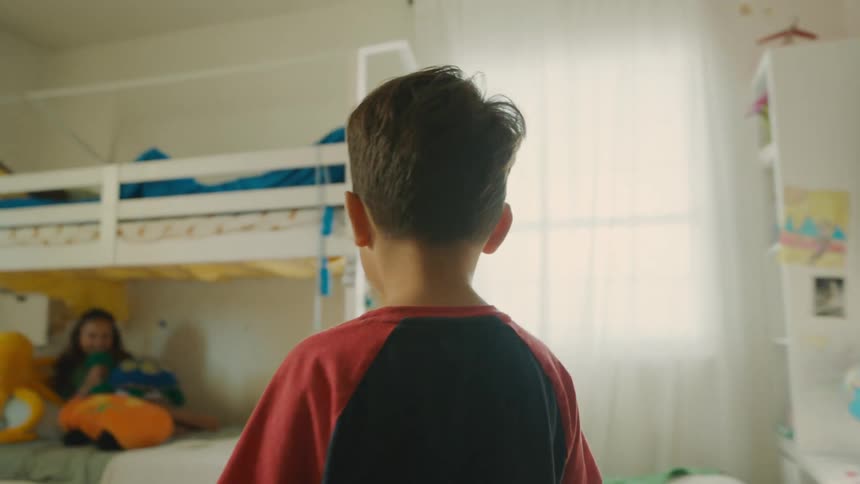 Boy finds his brother while playing hide and seek at home