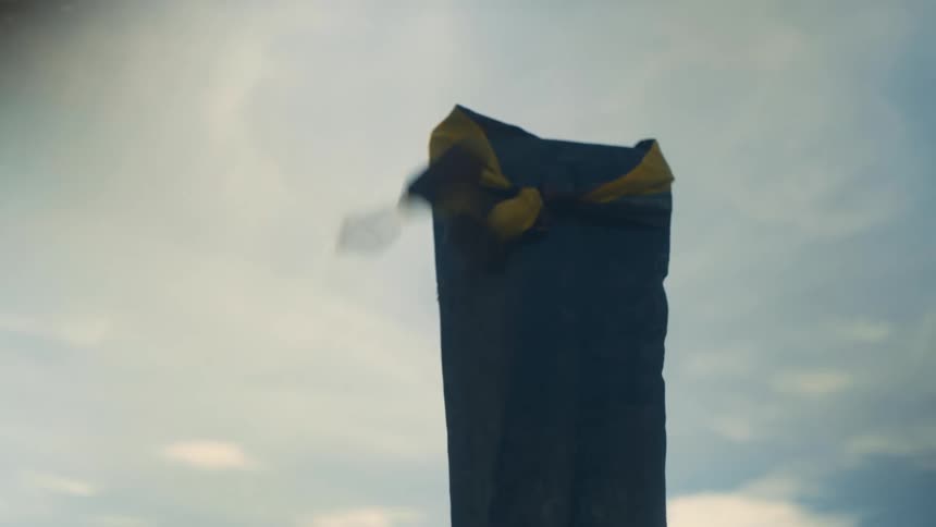 Structure of a wooden canoe covered with fabric that sways through the air