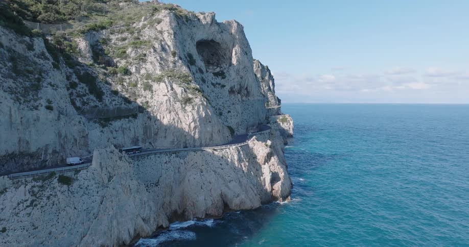Highway on a cliff of a mountain by the sea