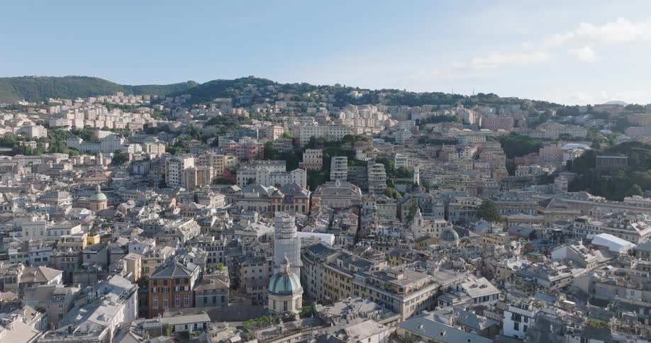 A city skyline filled with residential buildings under the bright midday sun