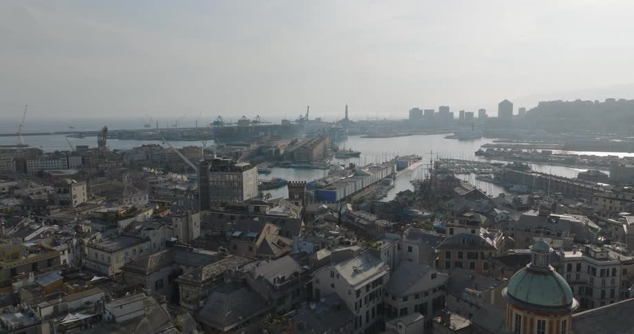 Traffic flows smoothly through a city near the busy port