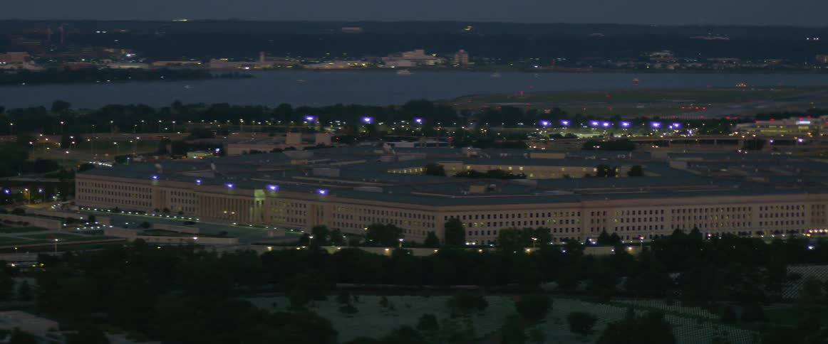 Lights begin to shine as sun goes down near pentagon