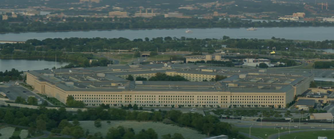 The pentagon building is near the water