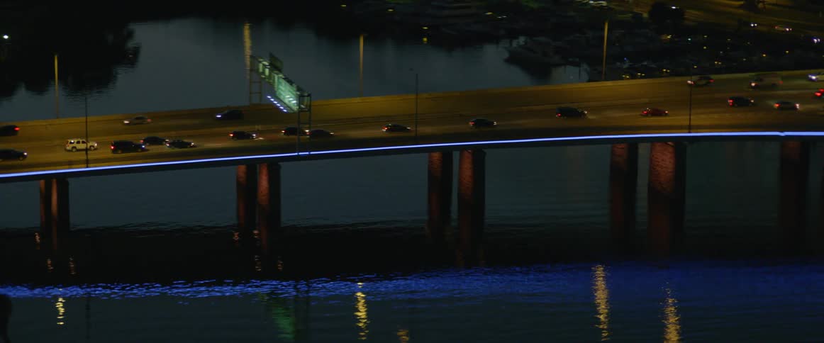 Traffic crosses a bridge over water