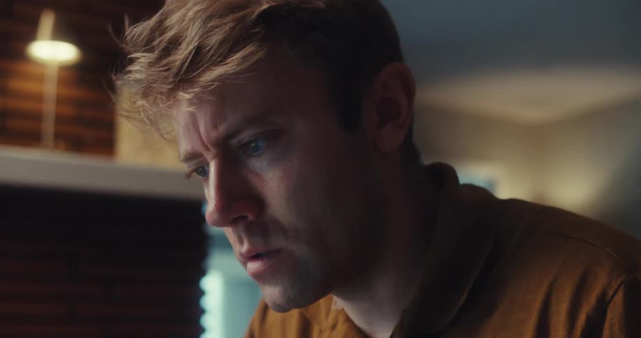 A close up footage of a man working indoor