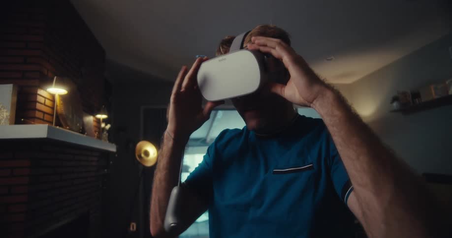 A footage of a man playing vr indoor