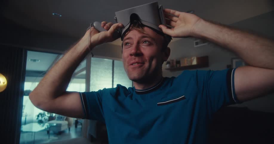 A close up clip of a man playing virtual reality