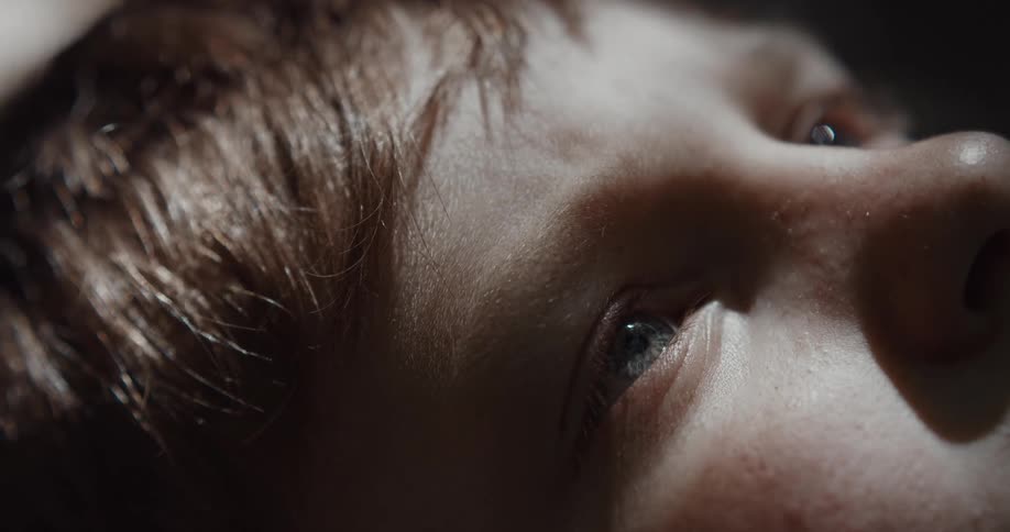A close up of a kids eyes and nose