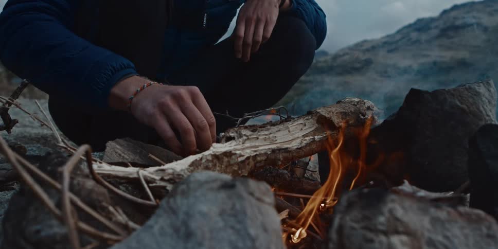 A footage of a person making a fire