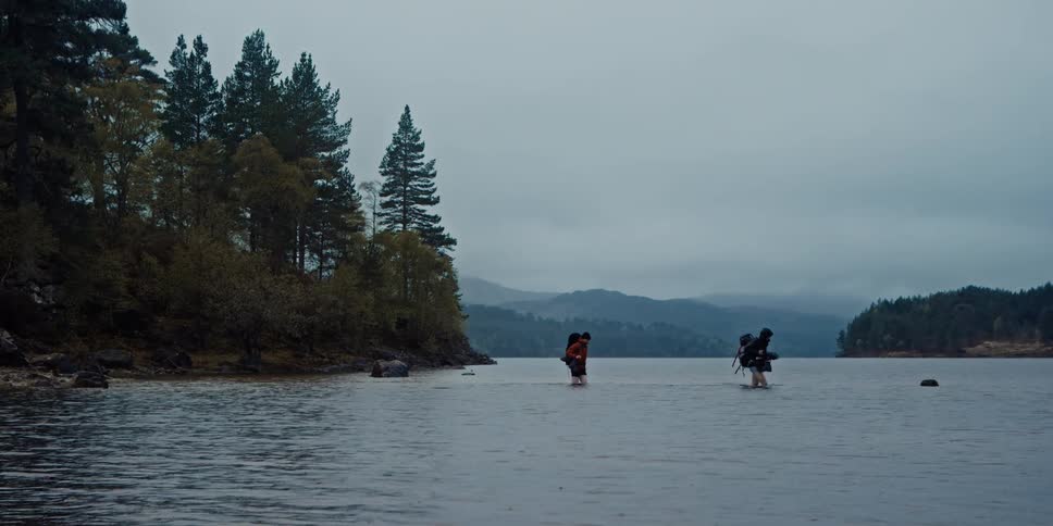A footage of people walking the river