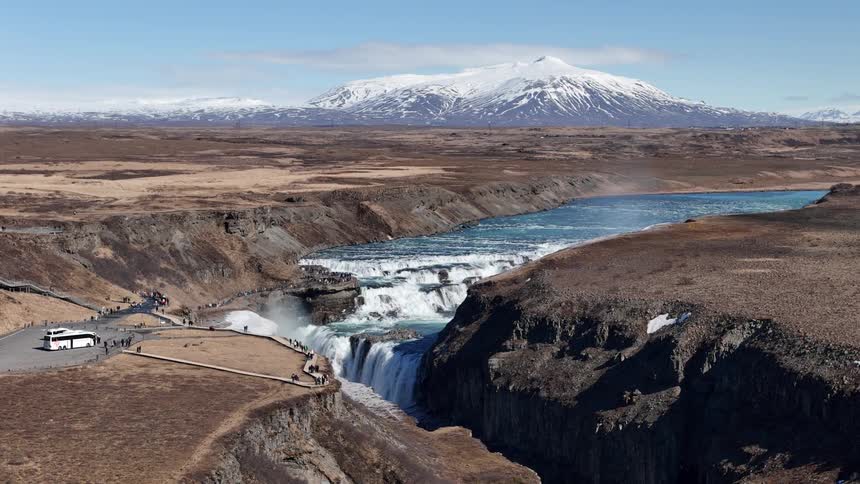 A large river ends in a waterfall