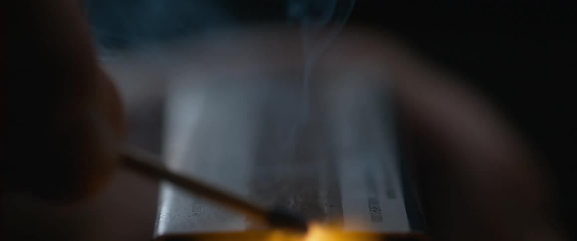 A match is lit in slow motion