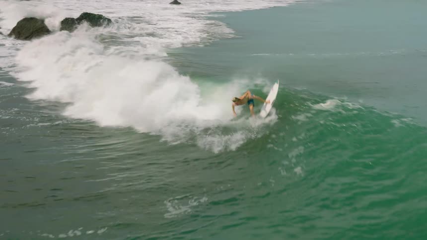 A footage of a person surfing the sea