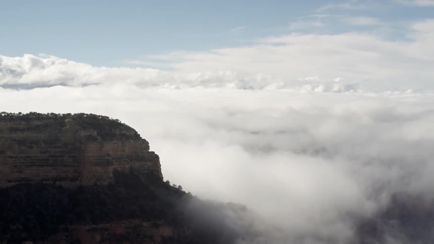Clouds touch the top of this mountain