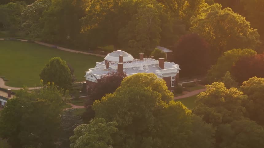 A mansion is in the middle of the forest