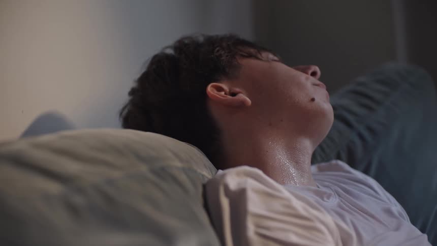 A man is wet on the couch