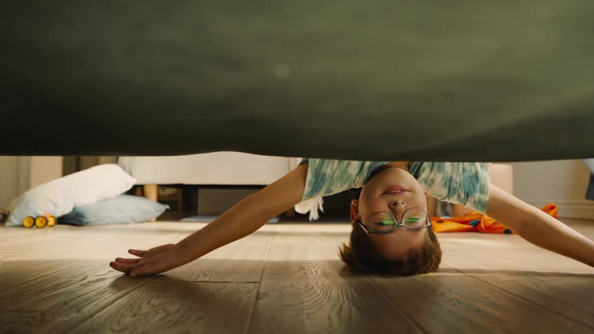 A footage of a kid playing in the room