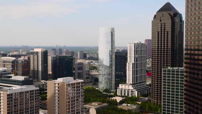 A city has skyscrapers of all different color materials