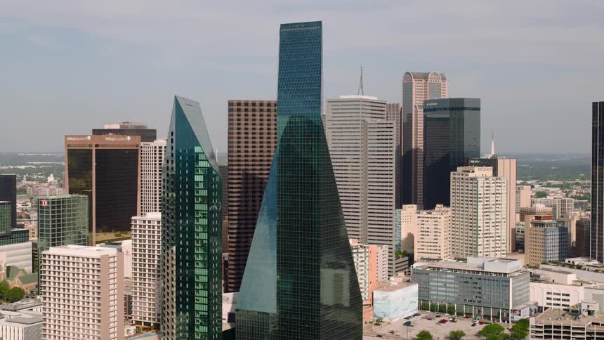 Skyscrapers with unusual architecture reflect the nearby buildings
