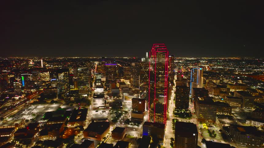 A large city at night with many buildings
