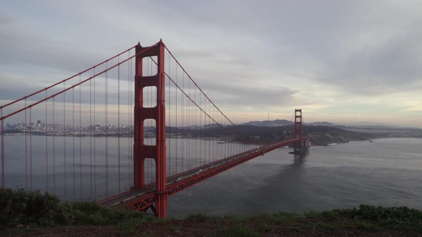 A large bridge stretches across the water