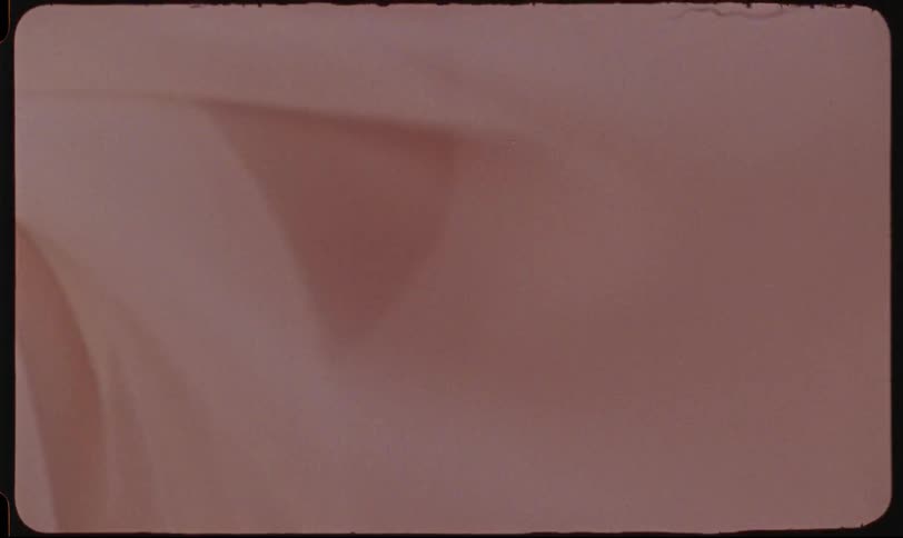 Close up of a transparent white scarf flying by the force of air