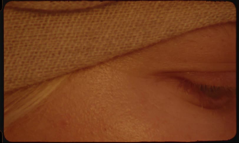 Extreme closeup of a persons eye conveying a quiet or introspective moment
