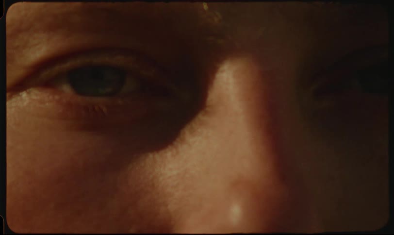 A woman blinking under the sunlight