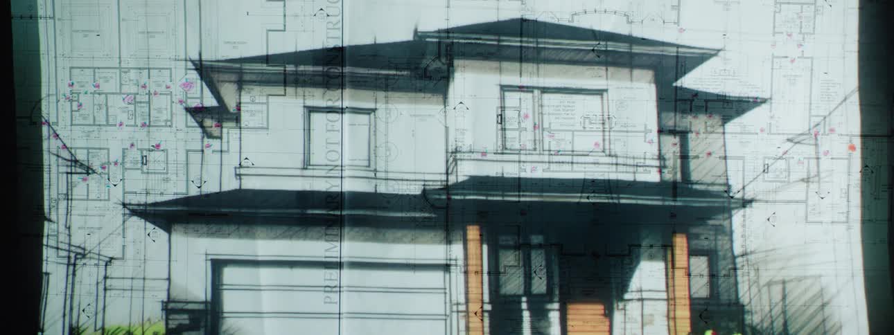 The blueprints of a house are overlapped on the building
