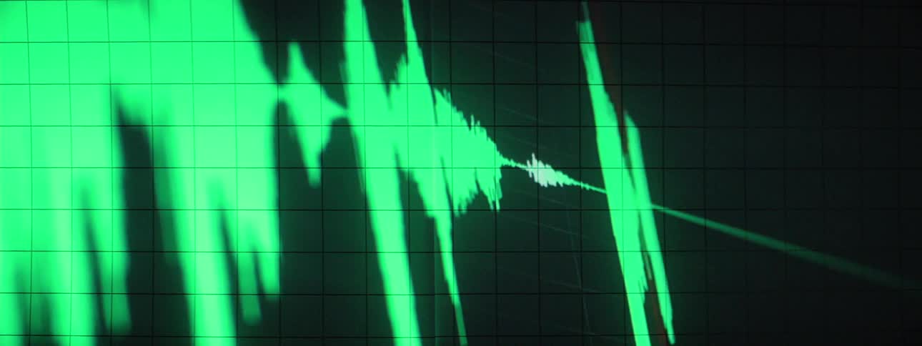 A sound frequency is showing on a monitor