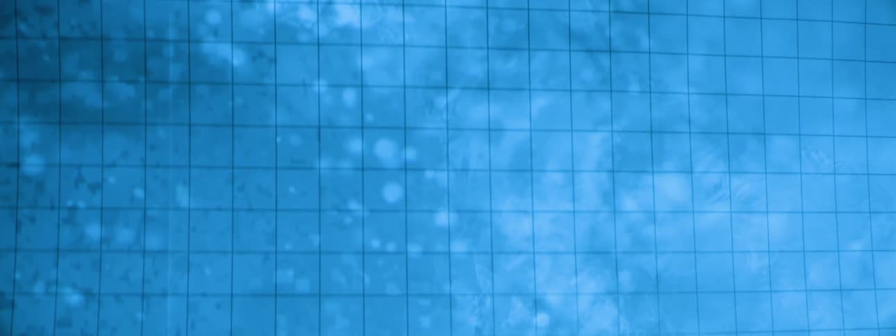 A blue screen displays shapes combining in the middle to create a humanlooking face