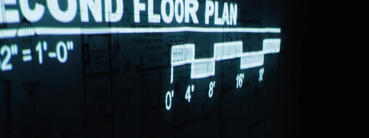 A second floor architectural plan is gradually revealed in blue against a dark background
